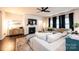Cozy living room featuring a fireplace and large windows for plenty of natural light at 7669 Tanglewood Way, Denver, NC 28037