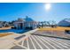 Neighborhood pool clubhouse with well-manicured landscaping and ample parking at 7669 Tanglewood Way, Denver, NC 28037