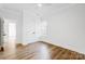 Clean, bright bedroom with a ceiling fan and double closets offers comfort and ample storage space at 901 Edgemont Ave, Belmont, NC 28012
