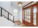 Bright entryway with hardwood floors and stairs at 901 Edgemont Ave, Belmont, NC 28012