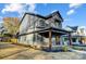 Two-story gray house with a wooden front porch at 901 Edgemont Ave, Belmont, NC 28012