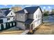 Beautiful home exterior featuring a covered porch and manicured landscaping at 901 Edgemont Ave, Belmont, NC 28012
