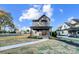 Charming two-story home featuring gray siding, covered porch, and walkway at 901 Edgemont Ave, Belmont, NC 28012