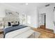 Comfortable main bedroom with plush bedding, natural light, and stylish decor, creating a relaxing space at 901 Edgemont Ave, Belmont, NC 28012