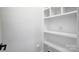 Image displays built-in shelving, creating a functional and organized storage solution in a clean, bright space at 901 Edgemont Ave, Belmont, NC 28012