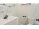 Clean and modern bathroom featuring a single sink vanity, a toilet, and matte black fixtures at 1423 Roseland Dr, Lincolnton, NC 28092