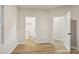 Spacious, empty room featuring an attached bathroom and natural light from the windows at 1423 Roseland Dr, Lincolnton, NC 28092