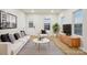 Bright living room featuring neutral tones, modern decor, and plenty of natural light at 1423 Roseland Dr, Lincolnton, NC 28092
