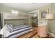 This bedroom offers a comfortable bunk bed and a mirrored closet, perfect for maximizing space at 18631 Vineyard Point Ln, Cornelius, NC 28031