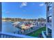 Picturesque marina view with numerous boats docked, offering a serene waterfront lifestyle at 18631 Vineyard Point Ln, Cornelius, NC 28031