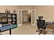 Home office featuring French doors and built-in shelving at 1908 Robbins Meadows Dr, Waxhaw, NC 28173