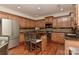 Modern kitchen with granite countertops and stainless steel appliances at 1908 Robbins Meadows Dr, Waxhaw, NC 28173