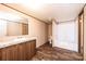 Bathroom boasts a large vanity and separate shower-tub at 3553 33Rd Street Ne Dr, Hickory, NC 28601