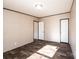 This light bedroom features wood-look floors and neutral walls at 3553 33Rd Street Ne Dr, Hickory, NC 28601