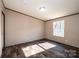 Tranquil bedroom features modern flooring, neutral walls, and bright natural light at 3553 33Rd Street Ne Dr, Hickory, NC 28601