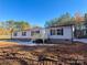 Charming single story home with light gray siding, black shutters, and a small entry deck at 3553 33Rd Street Ne Dr, Hickory, NC 28601
