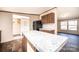 Close up of kitchen island with laminate countertop and view of kitchen at 3553 33Rd Street Ne Dr, Hickory, NC 28601