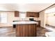 Bright kitchen features wood cabinets, modern appliances, and a functional center island at 3553 33Rd Street Ne Dr, Hickory, NC 28601