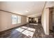 Sunlit living room seamlessly connects to kitchen, enhancing open-concept living at 3553 33Rd Street Ne Dr, Hickory, NC 28601