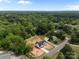 Aerial view of the home surrounded by a canopy of trees in a serene, expansive landscape at 5037 Faith Rd, Salisbury, NC 28146