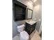 Bathroom featuring toilet, sink and built in storage at 1826 Birch Heights Ct, Charlotte, NC 28213