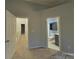 Bedroom showing entrance to hallway and bathroom at 1826 Birch Heights Ct, Charlotte, NC 28213