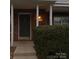 Exterior view of the brick house with a walkway leading to the front door with the house number at 1826 Birch Heights Ct, Charlotte, NC 28213