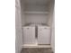 The laundry room features a matching washer and dryer set with a shelf above at 1826 Birch Heights Ct, Charlotte, NC 28213