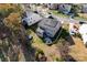 Aerial view of property showcasing backyard, patio, solar panels, and surrounding neighborhood at 2155 Galloway Ln, Concord, NC 28025