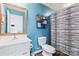 Modern bathroom with a sink, toilet, and a stylish shower curtain at 2155 Galloway Ln, Concord, NC 28025