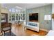 Gathering room with built-in media center and sunlit windows at 2408 Westfield Rd, Charlotte, NC 28207