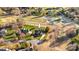 An aerial view of a brick house, with a surrounding golf course and manicured landscaping at 2425 Birdie Ne Ln, Conover, NC 28613