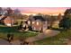 Stately brick home boasts mature landscaping, long driveway, and three-car garage at 2425 Birdie Ne Ln, Conover, NC 28613