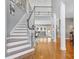 Open floor plan with staircase and large window at 2425 Birdie Ne Ln, Conover, NC 28613