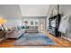 Cozy living room boasts hardwood floors and access to the backyard at 2425 Birdie Ne Ln, Conover, NC 28613