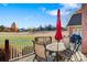 Enjoy outdoor living on this deck with golf course views and an umbrella-covered table at 2425 Birdie Ne Ln, Conover, NC 28613