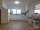 Bright kitchen featuring white cabinets and modern appliances at 8600 E Highway 74 E Hwy, Marshville, NC 28103