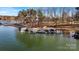 Private boat dock with multiple slips on the lake at 148 Quaker Rd, Mooresville, NC 28117