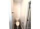 Powder room featuring a toilet, a black towel bar and hardware, and luxury vinyl plank flooring at 1589 Maysville Rd, Shelby, NC 28150