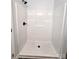 Bright shower features a clean white design and updated black fixtures at 1589 Maysville Rd, Shelby, NC 28150