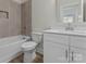 Full bathroom with tiled shower and granite vanity at 3110 Westerwood Dr, Charlotte, NC 28214