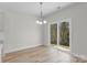 Dining area with sliding glass door that provides great natural light at 3110 Westerwood Dr, Charlotte, NC 28214