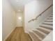 Bright entryway with hardwood flooring, staircase, and natural light from the front door at 161 Halite Ln, Waxhaw, NC 28173