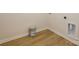 Empty laundry room with luxury vinyl plank flooring and washer and dryer hookups at 161 Halite Ln, Waxhaw, NC 28173