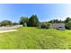 Large grassy backyard with a white picket fence and plenty of room to enjoy the outdoors at 7534 April Mist Trl, Huntersville, NC 28078