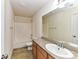 Clean bathroom with granite countertop and bathtub at 7534 April Mist Trl, Huntersville, NC 28078