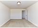 Spacious bedroom with neutral decor and carpet flooring at 7534 April Mist Trl, Huntersville, NC 28078
