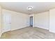 Simple bedroom with carpet, neutral walls, and a closet at 7534 April Mist Trl, Huntersville, NC 28078