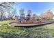 Community playground with slides and climbing structures at 7534 April Mist Trl, Huntersville, NC 28078