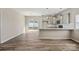 Open concept Kitchen featuring modern cabinetry, granite countertops, and stainless steel appliances at 8205 Stonemere Ln, Charlotte, NC 28215